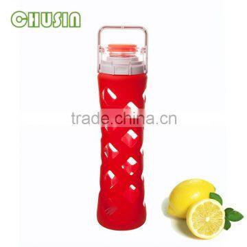 transparent glass water bottle with fruit infuser tea filter and silicone sleeve