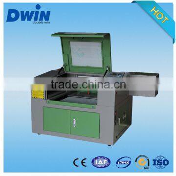 The life time of the laser tube can be over 10000 hours mobile phone laser engraving machine