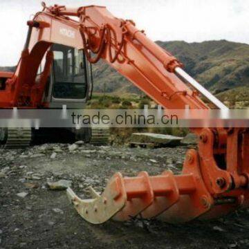 Excavator mounted Rake