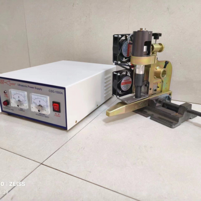 Ultrasonic Textile Cutting System for Synthetic Fiber Materials With Dust-Free Operation