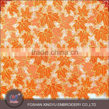 Hot sale fashion orange maple leaves shape chemical lace embroidery fabric wholesale