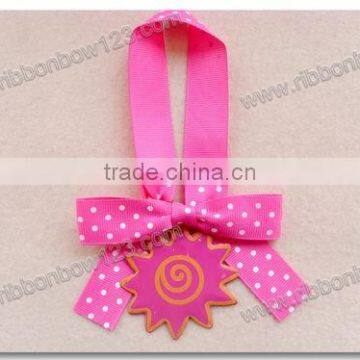 Pink logo ribbon bow with lable for gift