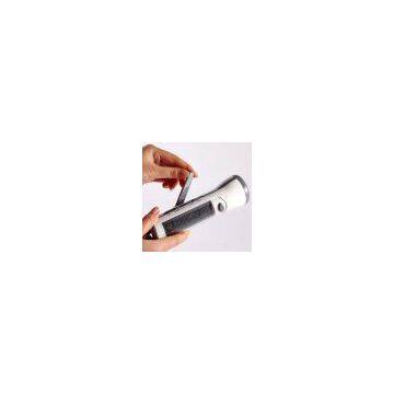 Solar dynamo torch radio charger