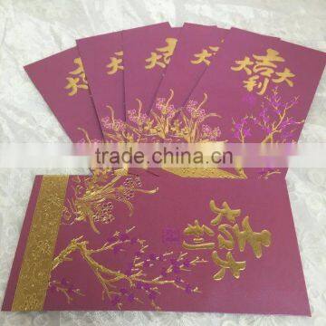 Red pocket with golden floral embossed logo for Chinese new year