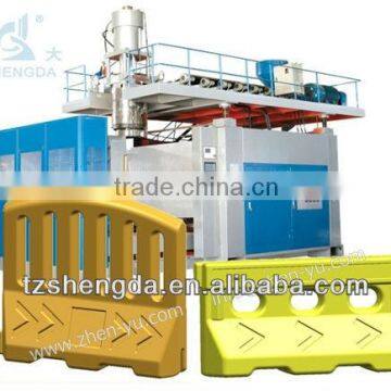 Plastic road barrier blowing machine