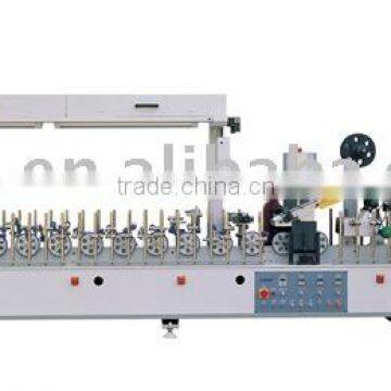 Automatic profile wrapping machine