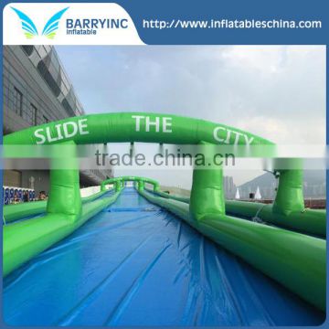 Long crazy singel/double/three lane slide the city , inflatable water slip n slide for adult