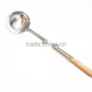 stainless steel soup ladle with wooden handle