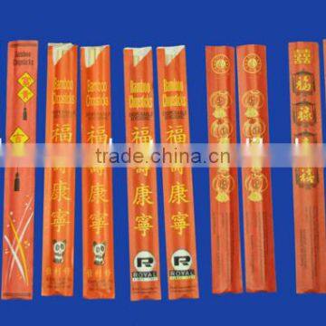 red paper wrapped disposable bamboo chopsticks