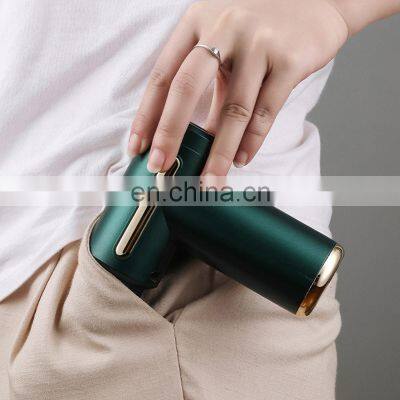 Super Quiet Handheld Electric Deep Tissue Portable Percussion Muscle Massager Body Mini Massage Gun With 4 Massage Heads photo-4