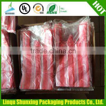 C folded t-shirt bags on roll / vest shopping bags / stripe bag manufacturing