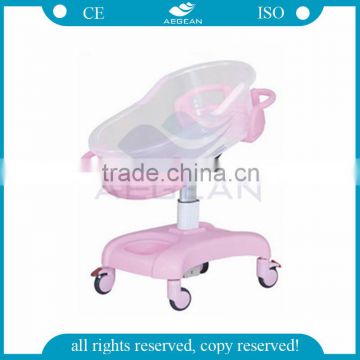 pink color AG-CB011 CE ISO movable hospital plastic baby crib medical infant cot