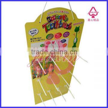 desktop cardboard display with peg hooks
