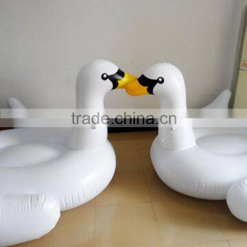 giant inflatable swan pool float and flamingo pool float