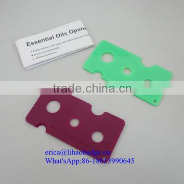 Plastic essential oil key opener for essential oil bottle with instructions