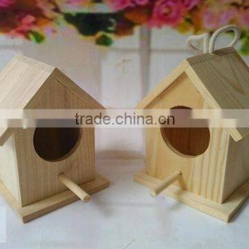 Small outdoor wooden bird house