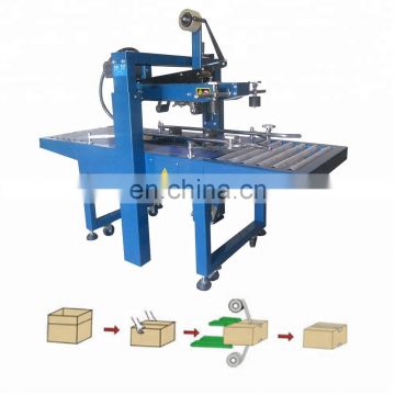 Adhesive tape up and down drive carton sealer FXJ6050B carton box sealing machine