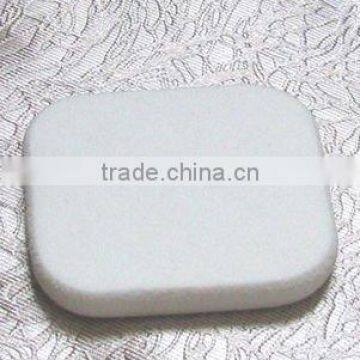 white cosmetic sponge