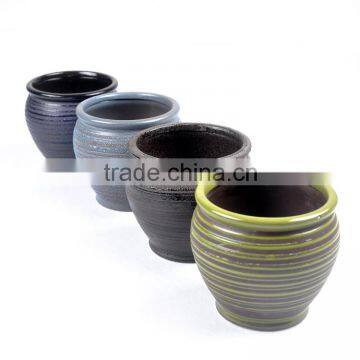 Stocked indoor ceramic flower pot