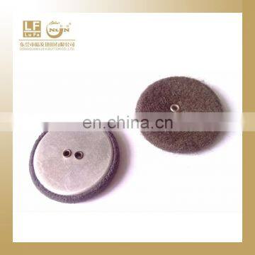 Fabric covered button or leather button