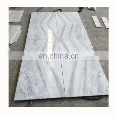 White Volakas marble interior wall cladding, book match wall decoration