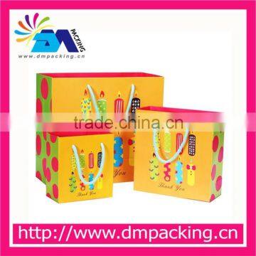 colorful kids gift paper bag for children's garments