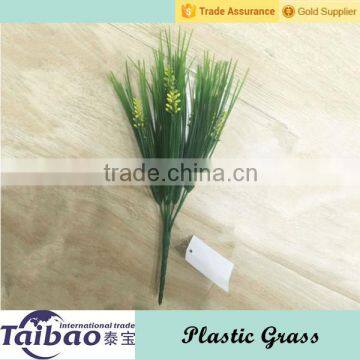 With a yellow flower mini green artificial plant