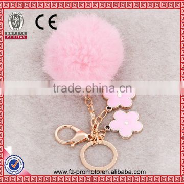 Soft fox fur ball keychain with flower pendant