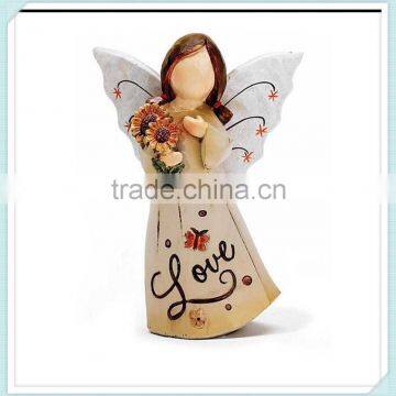 painted small resin angel figurine