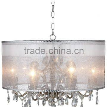 11.15-2 a sculptural antique silver frame behind a sheer organza shade Organza Silver Pendant Light