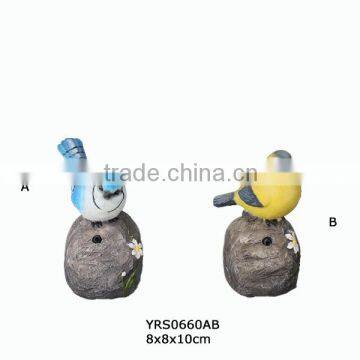 set 2 garden decoration solar power bird caller with shadow control, and resin stone with flowers