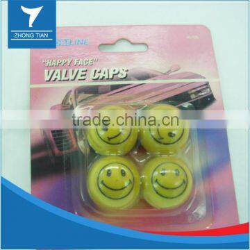Novelty tire valve caps with Happy Face design