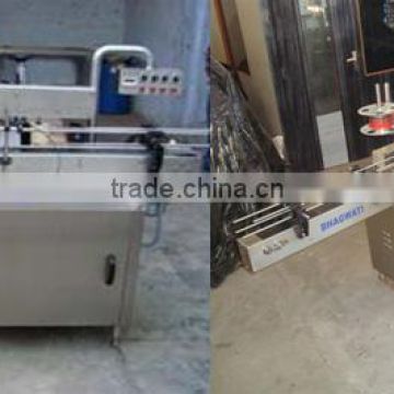 Automatic Four Head Volumetric Liquid Filling Machine