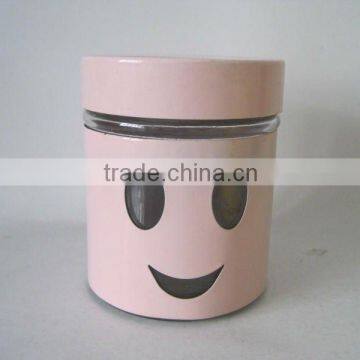 glass canister with metal casing