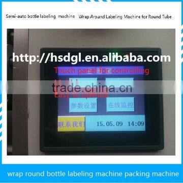 Semi-Automatic bottle label shrinking machine PET labeling shrinking for mineral water,beverage,food chemical commodity industry