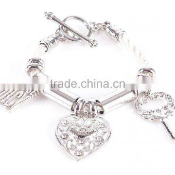 charm bracelet with heart-shaped pendant