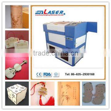 good character acrylic wood co2 laser engraving cutting machine with good after-sales aervice overseas