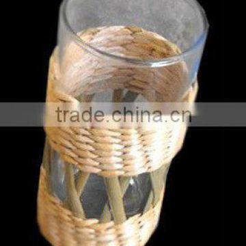 glass bottle with willow and rattan craft