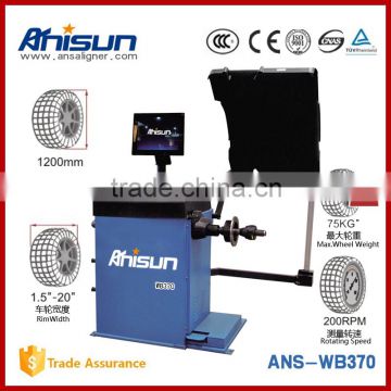 laser wheel aligner tool balancer in automotive workshop