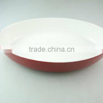 red oval shape ceramic bakeware porcelain bake plate with hands in stocklots