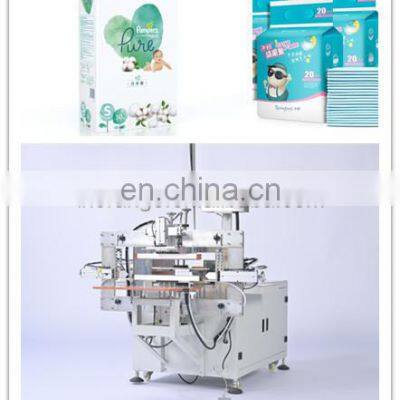 Cheap Price Semi Automatic Toilet Paper Baby Diaper Sanitary Napkin Packing Machine for Sale photo-2