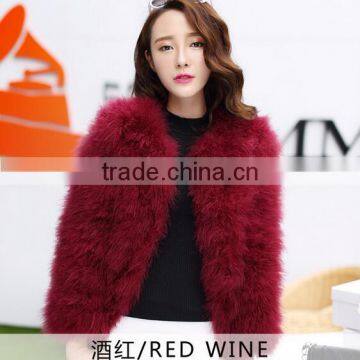 Woman's winter coat and ostrich sweater vest Beautiful winter coat/ turkey feather long coat