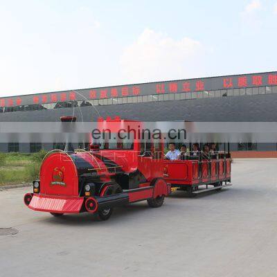 Children play outdoor carnival trackless train fun road trains theme park attraction tourist train