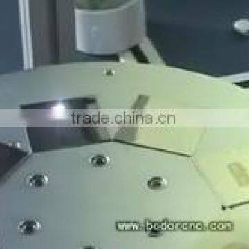 Automatic turntable laser marker