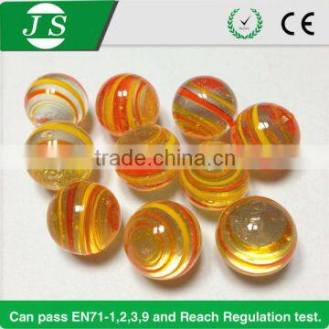 wholesale new design high quality yellow with red swirl glass marbles factory