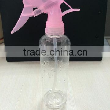 pink empty plastic bottles with trigger sprayer