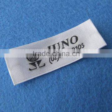 sewing on woven label for garment clothes