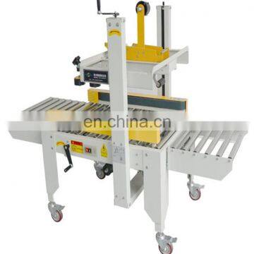 Carton Box Tape Sealing Machine Carton Box Automatic Folding Sealing Strapping Machine