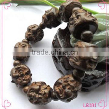 Wholesale cheap bodhist buddha bracelet beads Aloes carved bracelet                        
                                                Quality Choice