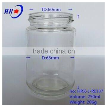 transparent glass jar with golden lid for food package